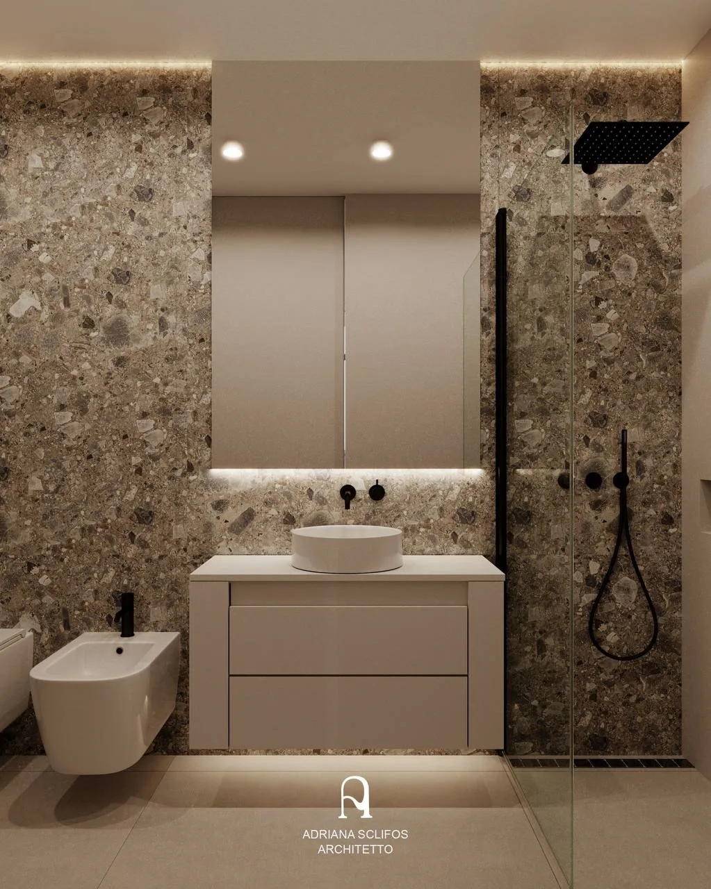 Bagno con rivestimento effetto terrazzo